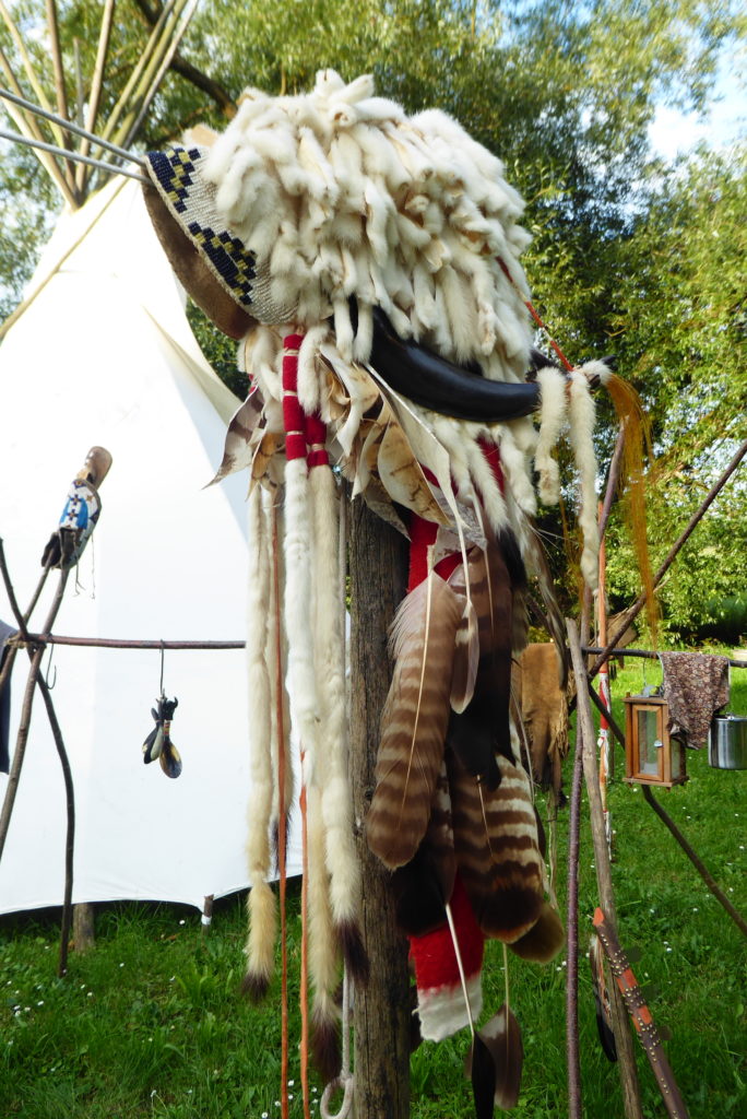 Authentic Camp 2021 - Lakota ermine headgear in front of teepee