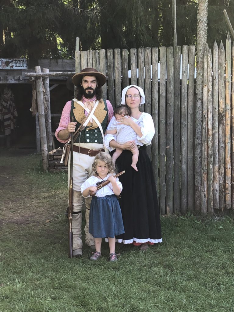 Authentic Camp 2021 - Settler family in front of trading post